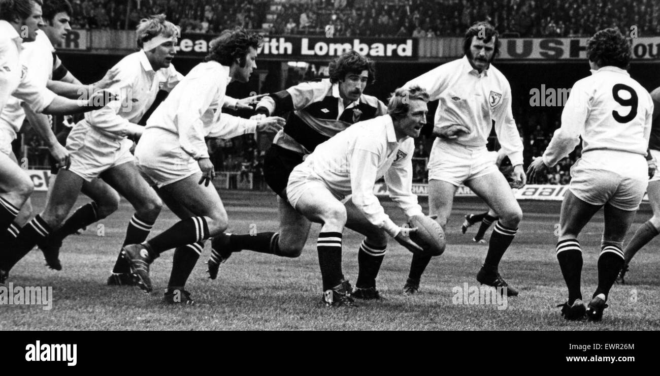 Swansea's Welsh international Phil Llewellyn feeds his scrum half, Huw Davies.  29th April 1978. Stock Photo