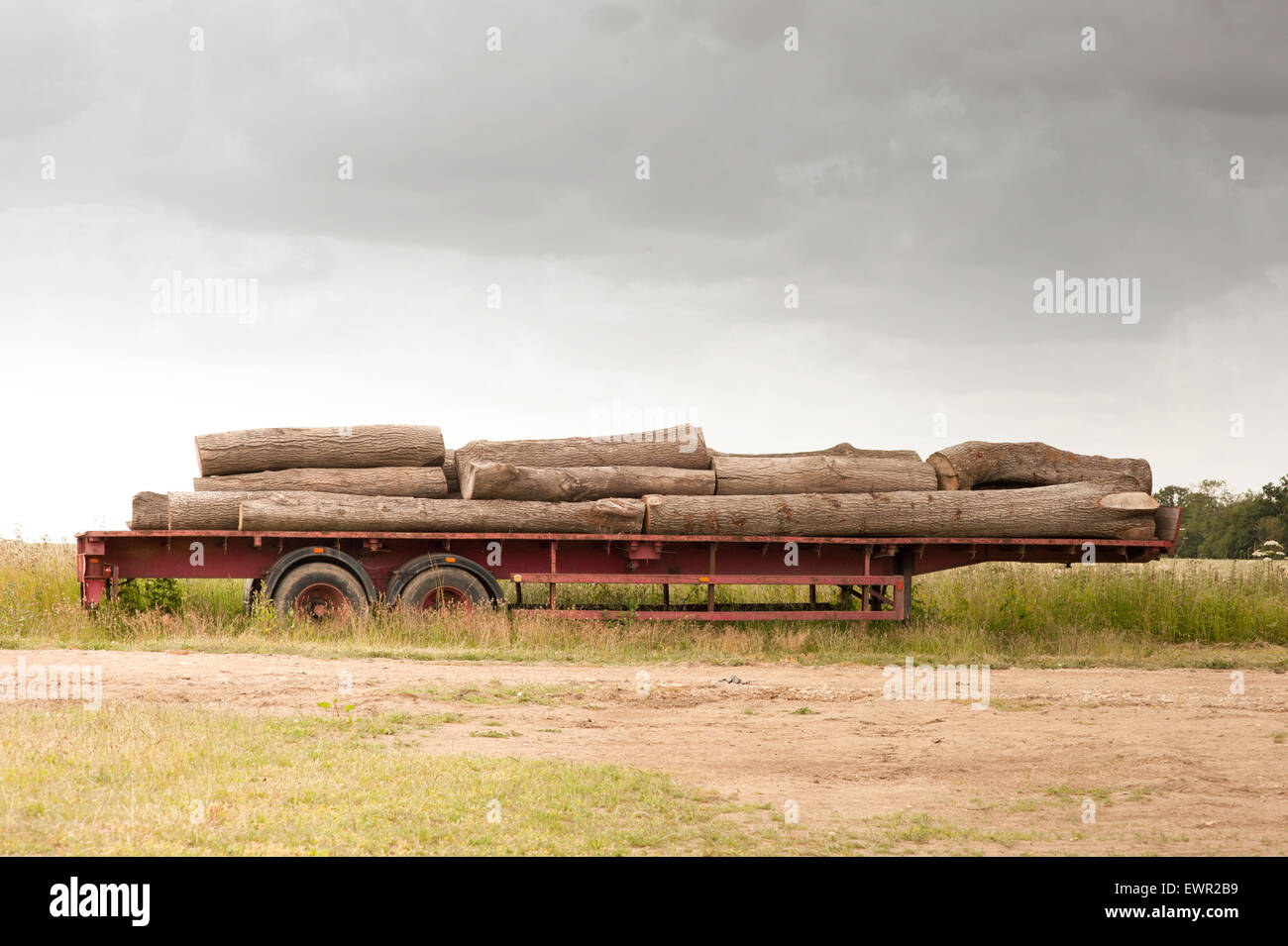 [tree trunk] [trailer hitch] red countryside Stock Photo