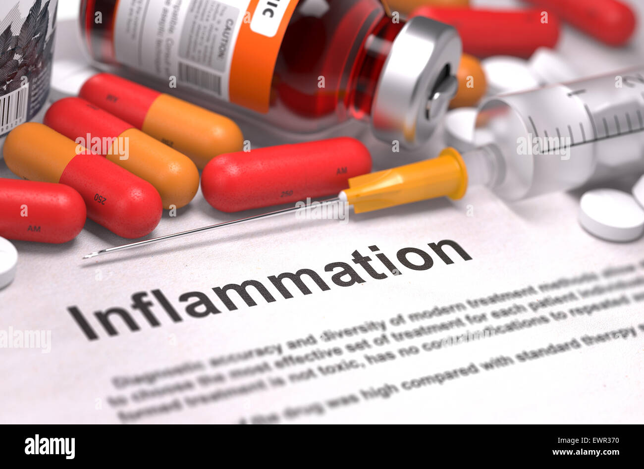 Inflammation - Medical Concept with Red Pills, Injections and Syringe. Selective Focus. Stock Photo