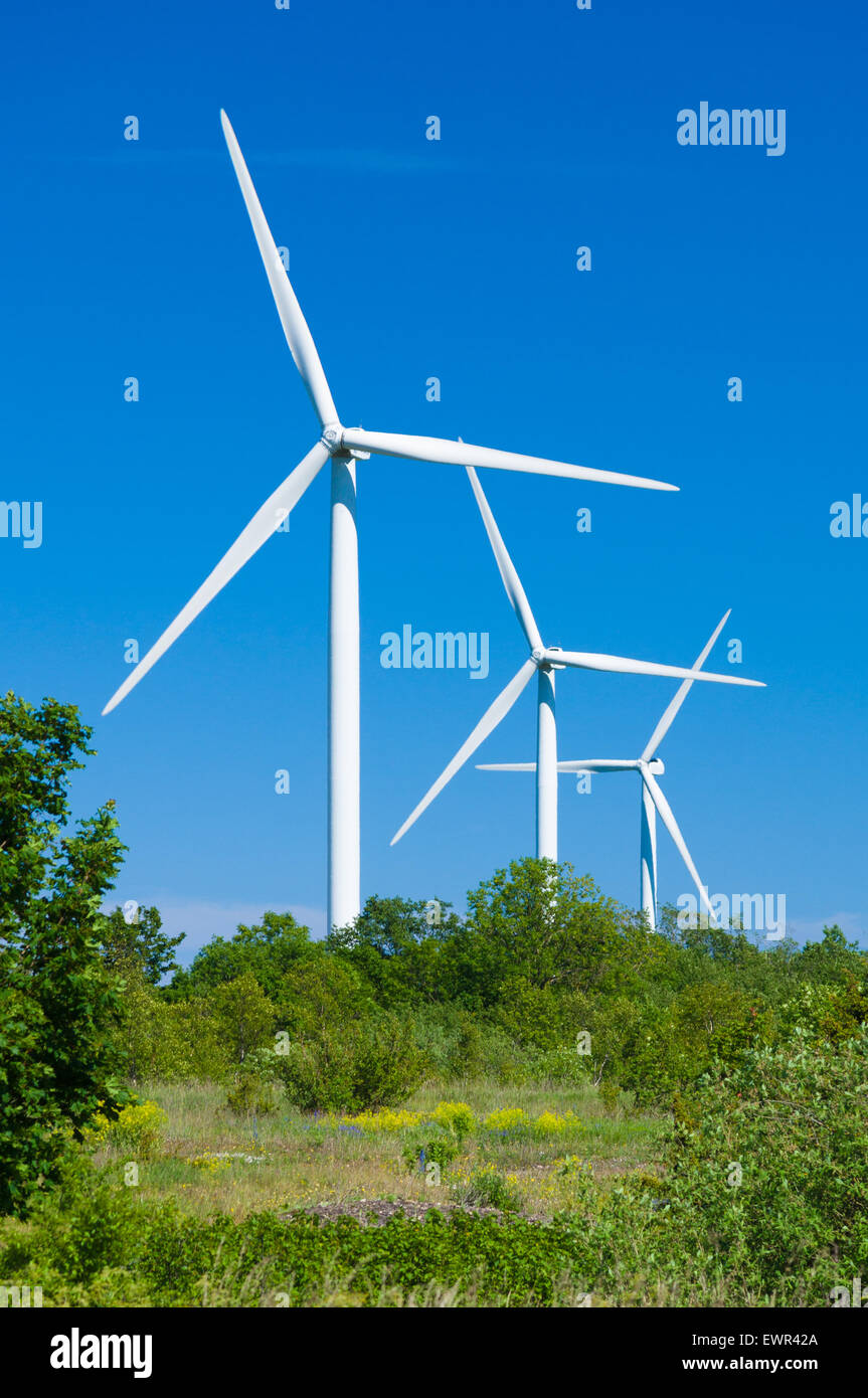 Wind turbines generating electricity. Nature protection concept Stock