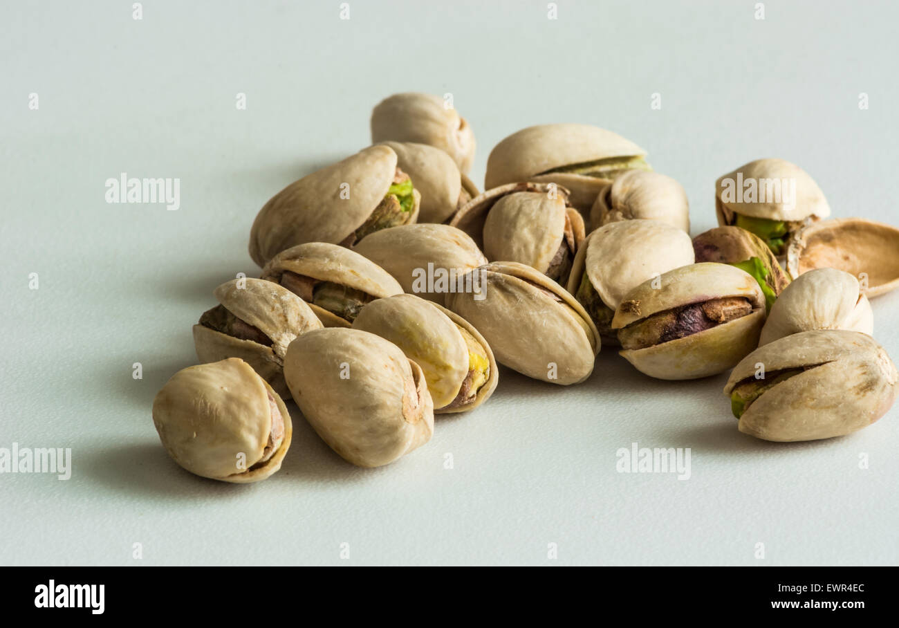 a group of pistachios in their shell Stock Photo Alamy