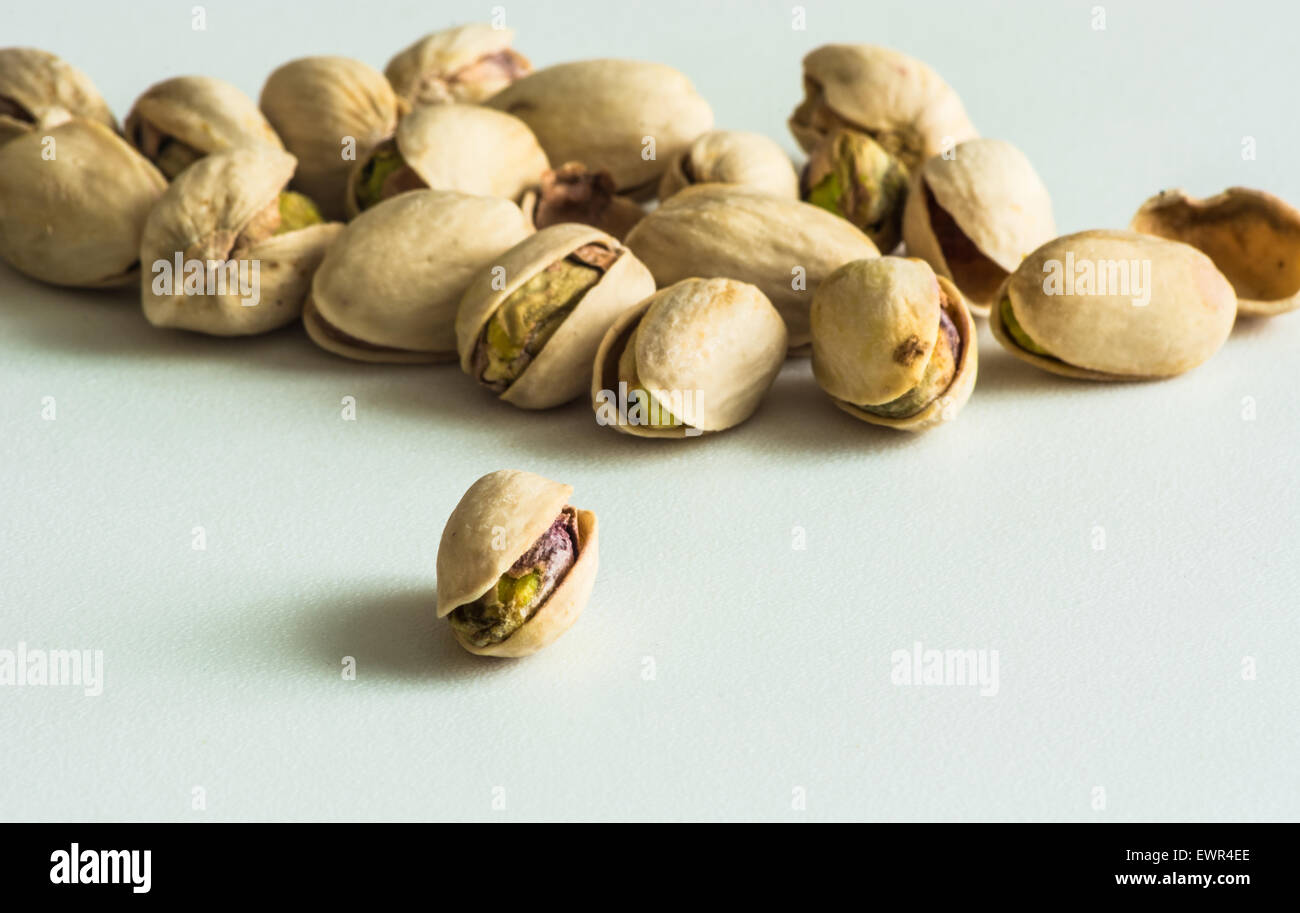 a group of pistachios in their shell Stock Photo Alamy