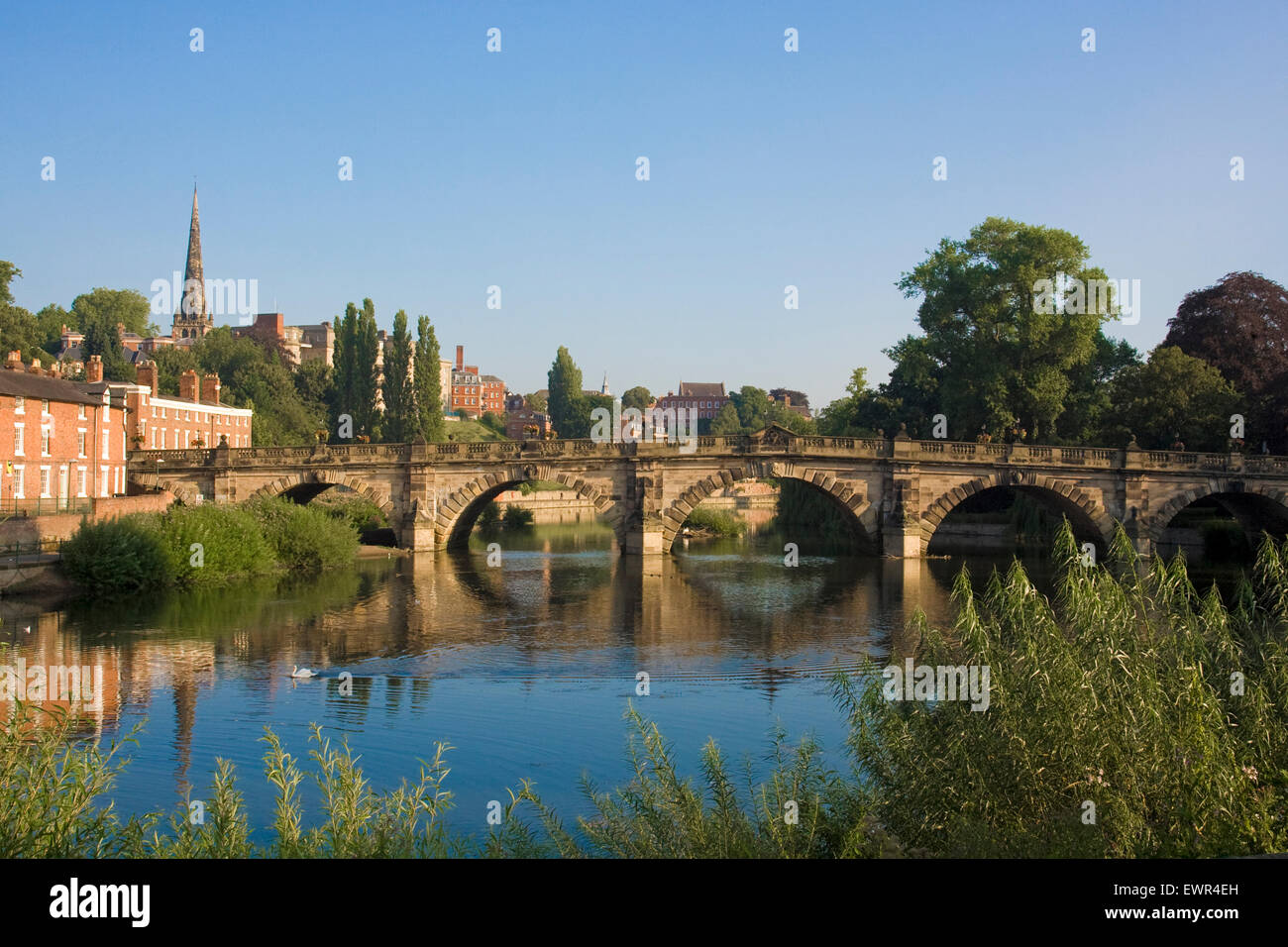 Under clear blue skies, English Bridge crosses the River Severn in Shrewsbury, Shropshire. Picture taken early in the morning in August 2014. Stock Photo
