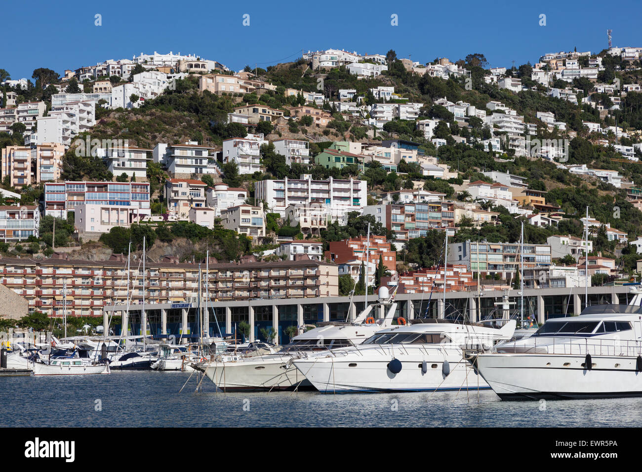 Yachts and boats in the marina of Roses, Costa Brava, Catalonia, Spain Stock Photo