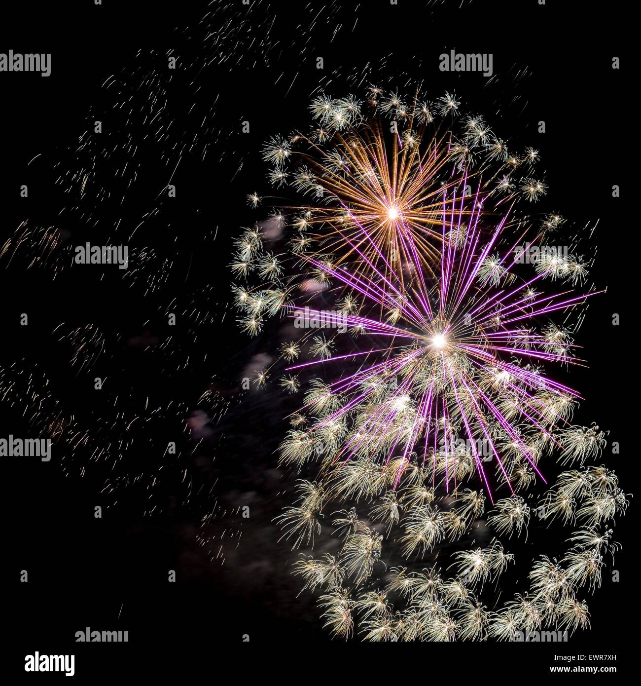 Light drawn picture made due to long time exposure of fireworks explosion against black sky Stock Photo