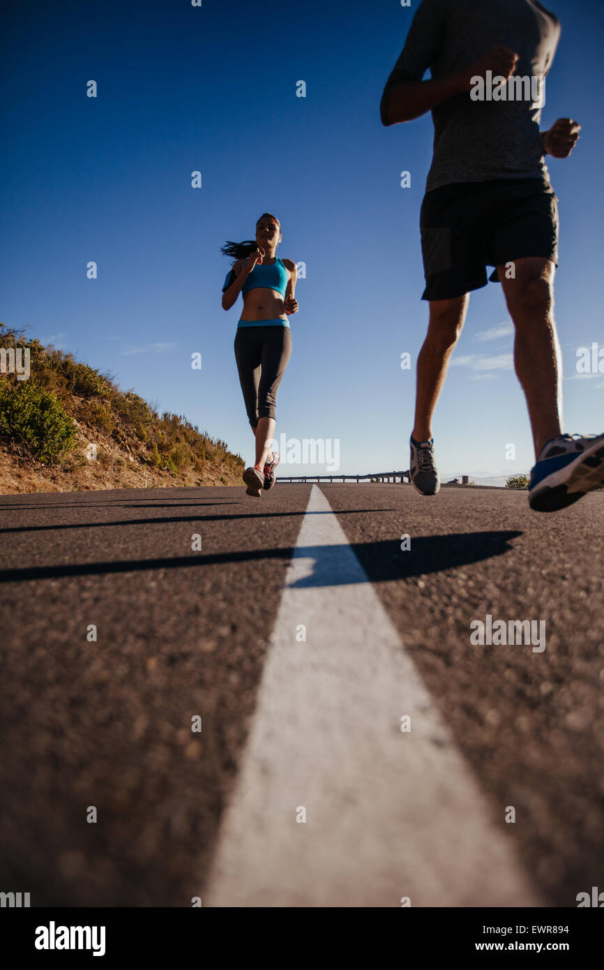 Nude man and woman running, front view, b&w Stock Photo - Alamy