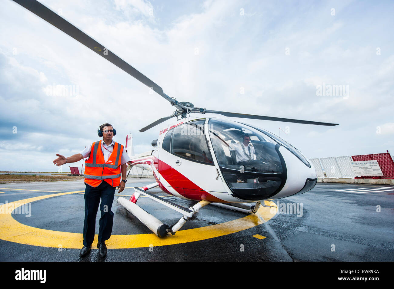 Helicopters and helicopter flight at a heliport in Monaco Stock Photo