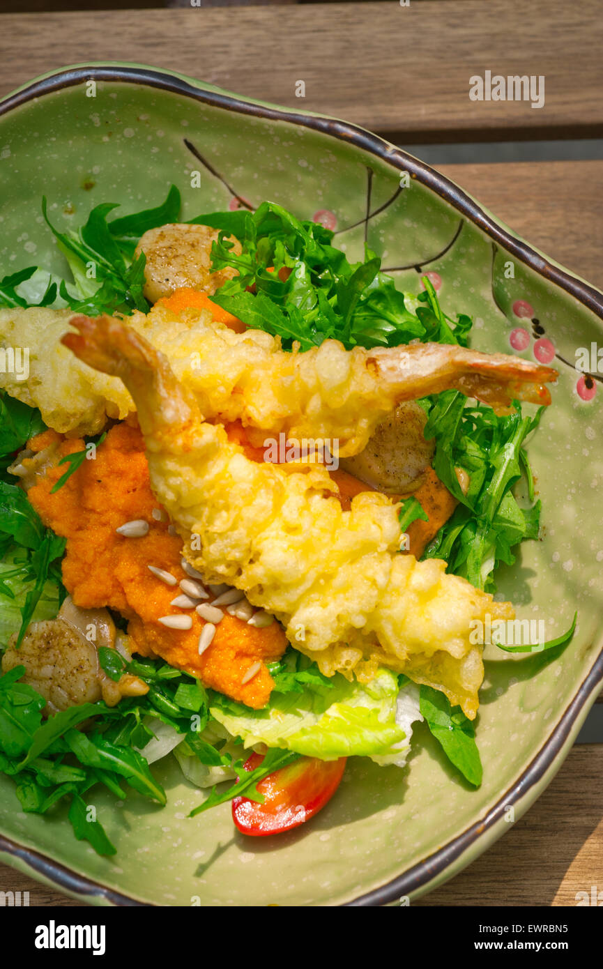 fresh deep fried Japanese tempura shrimps with salad and sea urchin ...