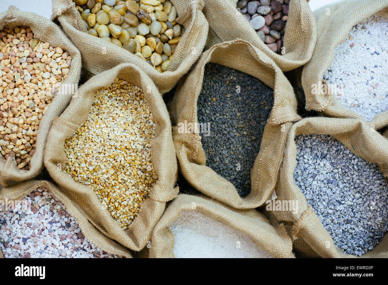 Sacks with decorative stones. Close up. Stock Photo