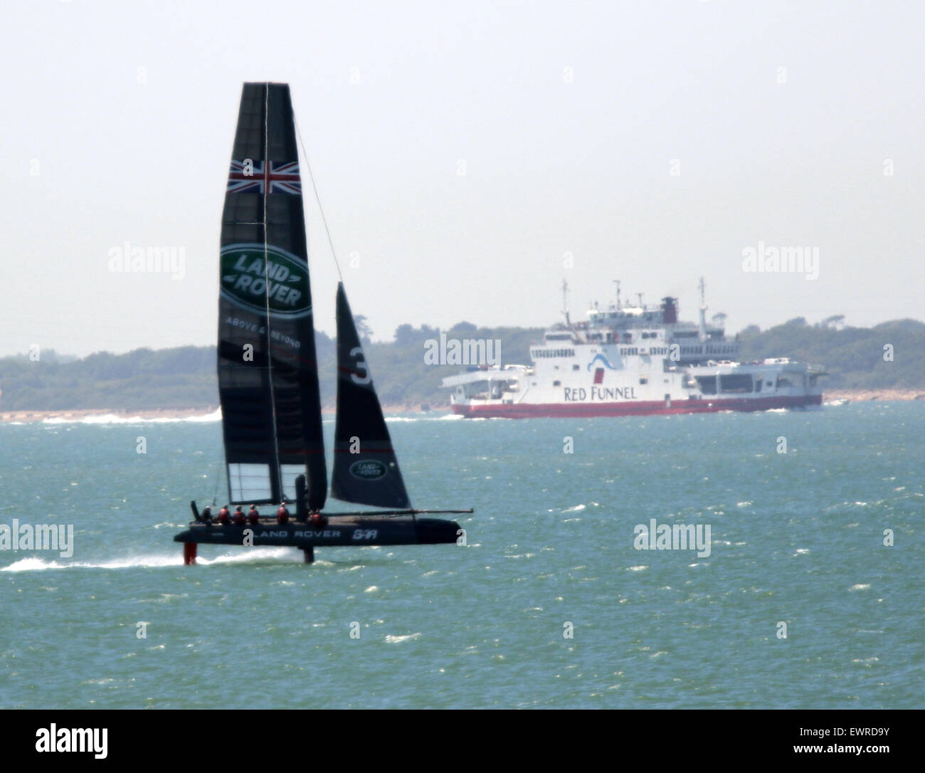 Lee on the Solent, Hampshire, UK. 30th June, 2015. Sir Ben Ainslie didn’t let the baking sunshine stop him from getting out on the water with his new Boat and racing team this morning.   The competitive challenger is out  training for the 35th America’s Cup. Sir Ben aims to win the oldest trophy in sport and bring the Cup back to Britain where it all began over 160 years ago. The Sportsman and his crew of ten spent the morning racing in the Solent watched by many people trying to keep cool on the beach.    Credit:  uknip/ Alamy Live News Stock Photo