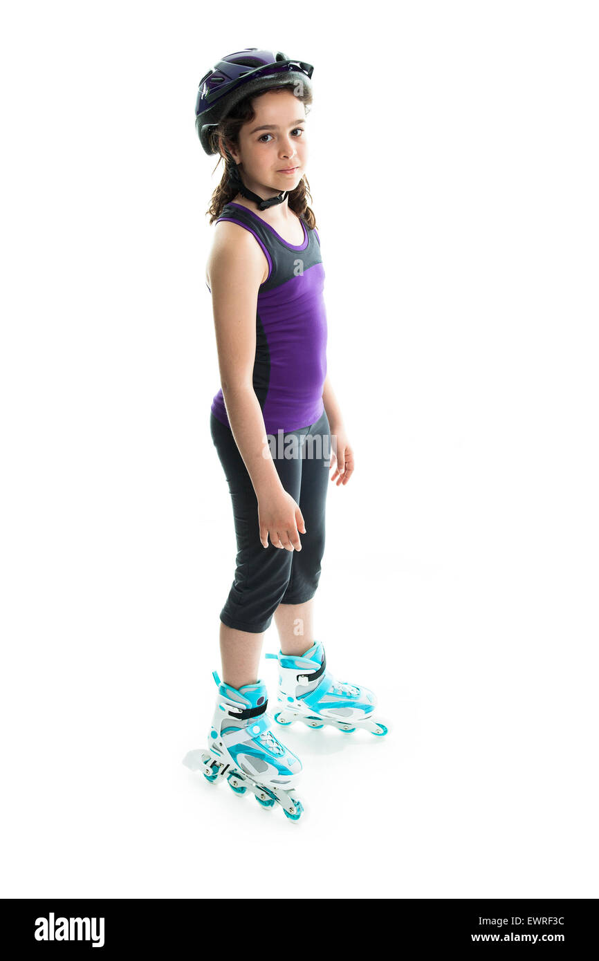 portrait of girl on rollers skating isolated on white background Stock Photo