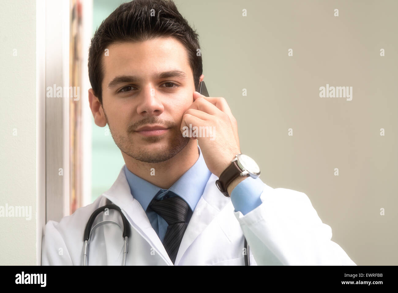 Handsome doctor talking young hi-res stock photography and images - Alamy