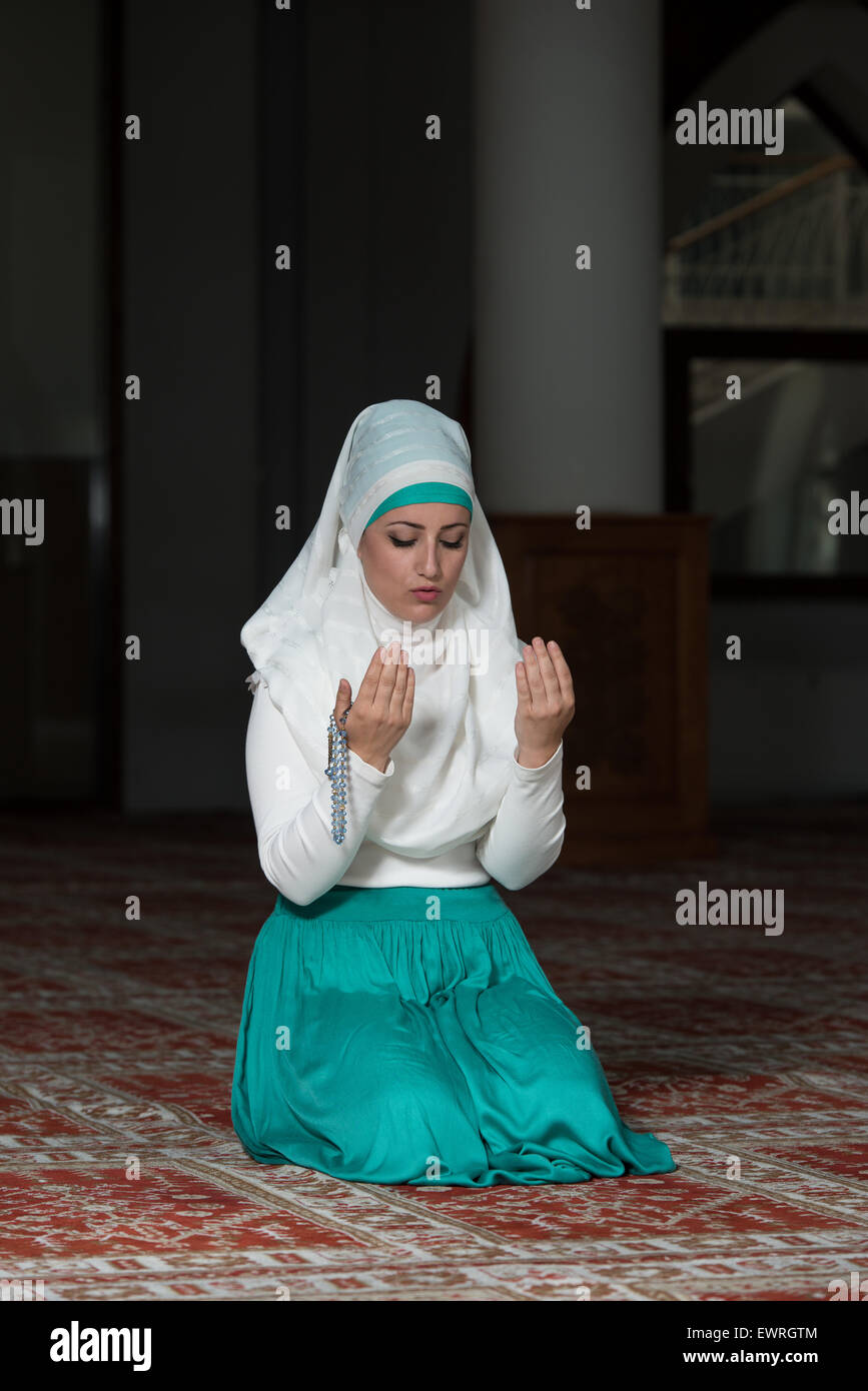 Young Muslim Woman Praying In Mosque Stock Photo - Alamy