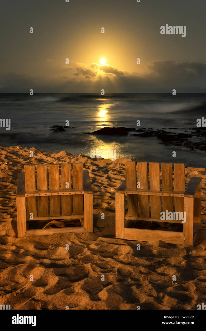 Chairs and moonset. Hawaii, The Big Isalnd. Stock Photo