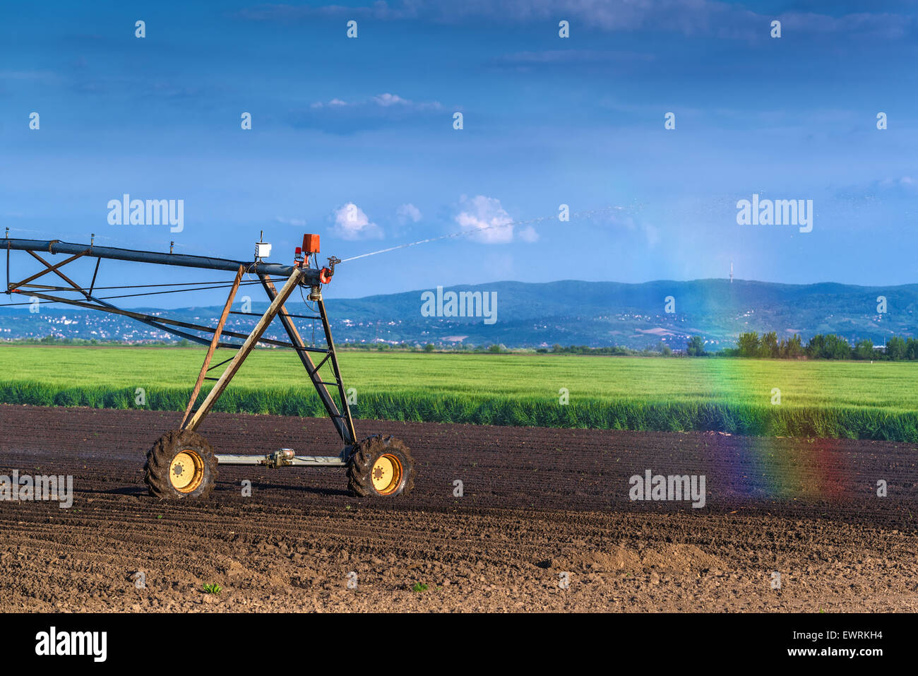 Automated Farming Irrigation Sprinklers System in Operation with Small