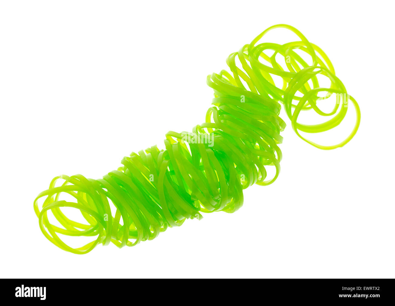 A group of small neon green rubber bands used for hair ponytails on a white background. Stock Photo