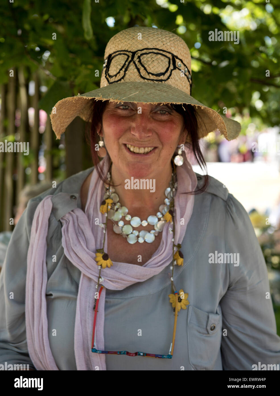 Hmapton, Surrey, UK. 30th June, 2015. A woman wearing a straw hat at The Hampton Court Palace Flower Show in East Moseley, Surrey, UK Credit:  Ellen Rooney/Alamy Live News Stock Photo