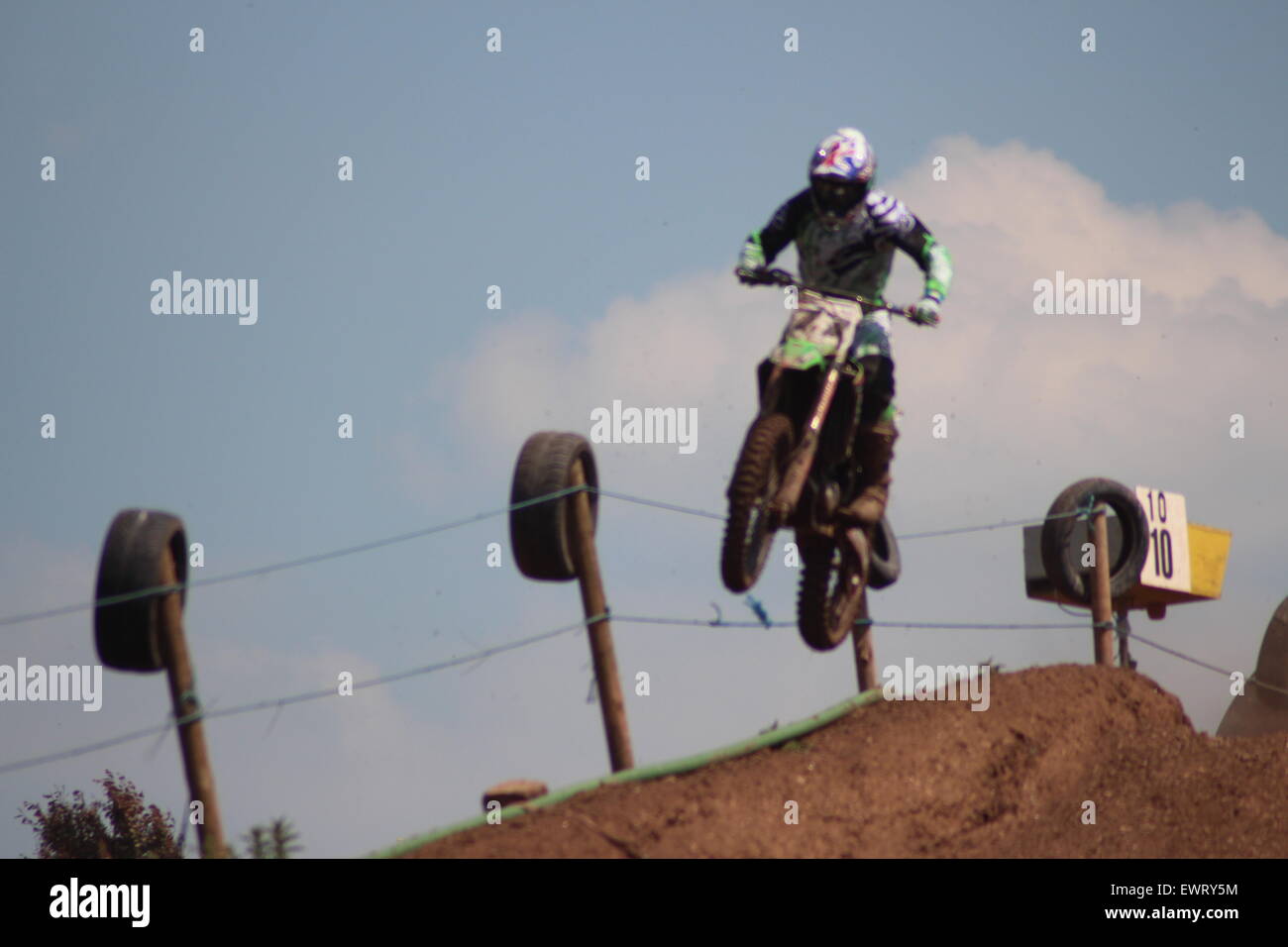 Action motorcycle, motocross, Speed and stunts leaping through the air Stock Photo