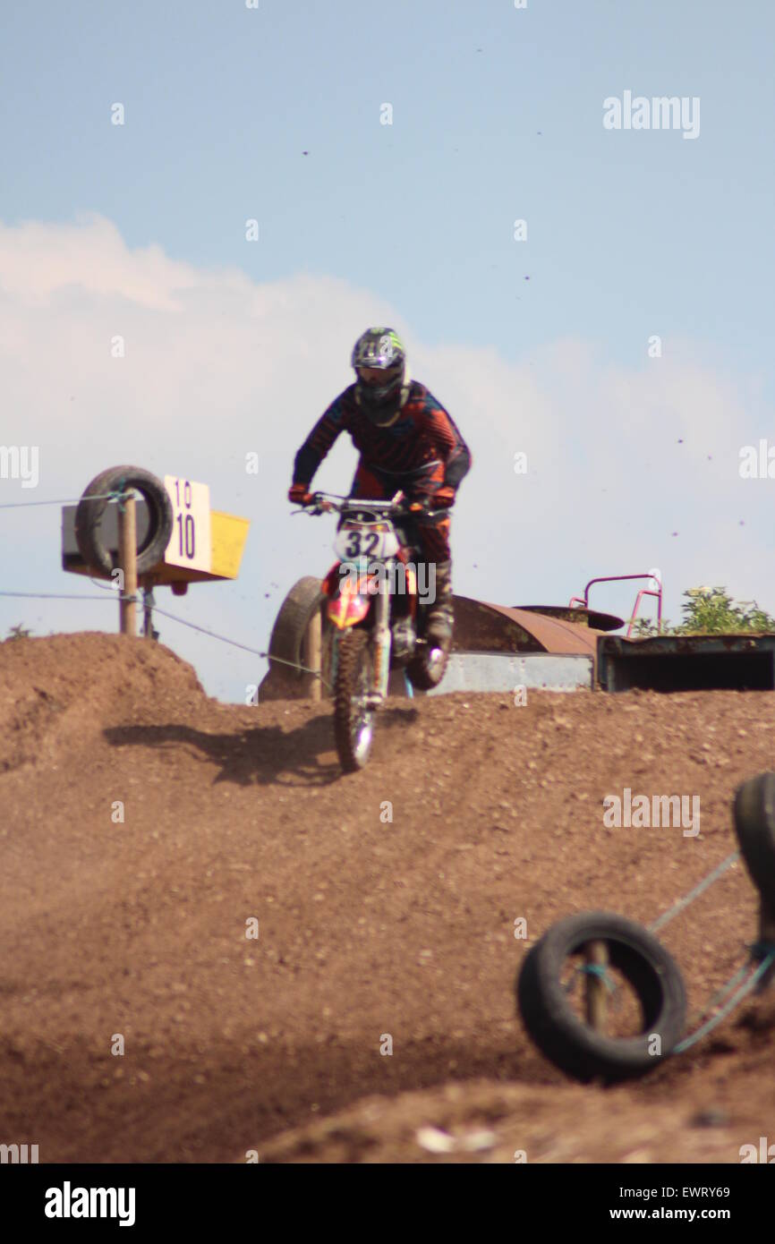 Action motorcycle, motocross, Speed and stunts leaping through the air Stock Photo