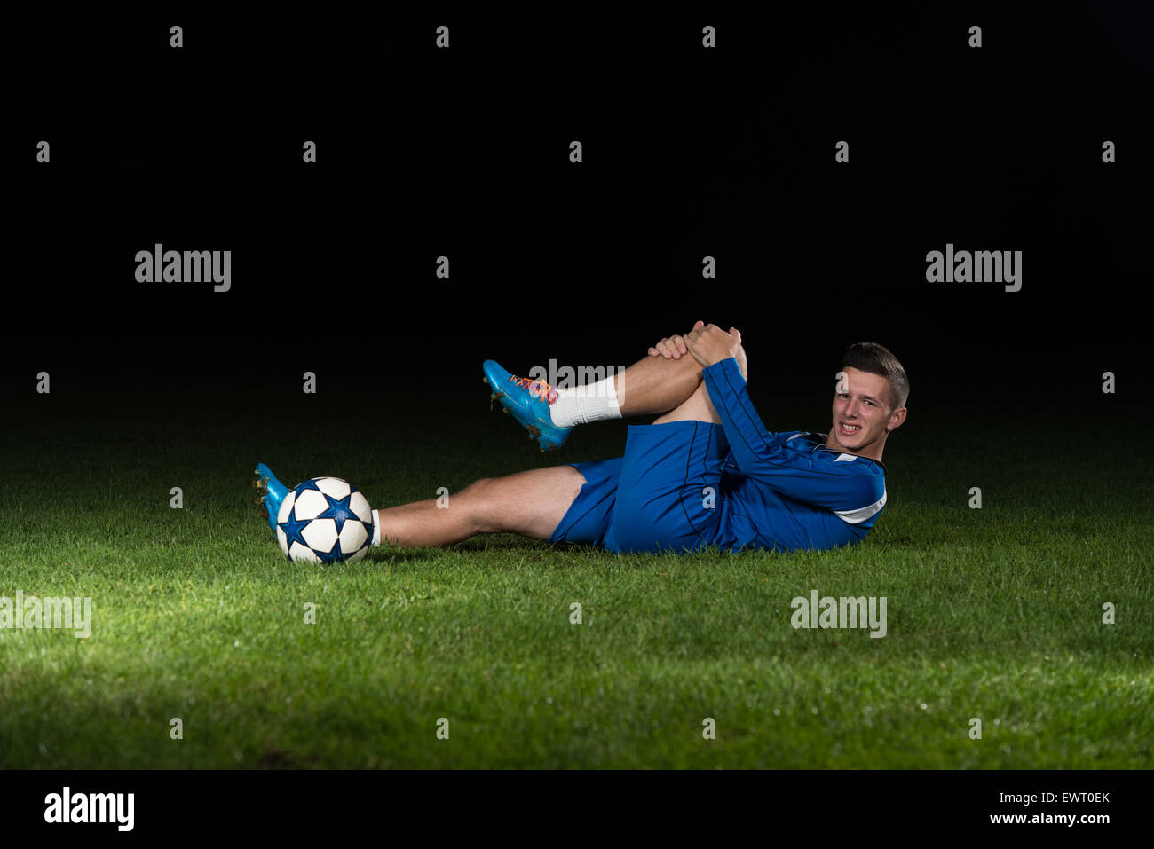 Soccer Player Have Pain Injury Accident On Football Game Stock Photo