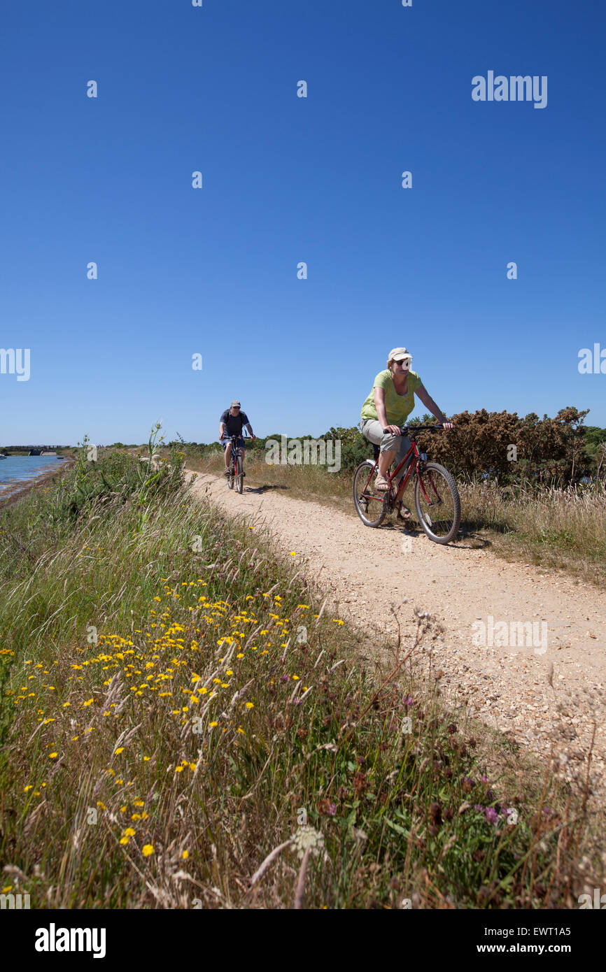 Cycling on the Solent Way between Lymington and Keyhaven Stock Photo