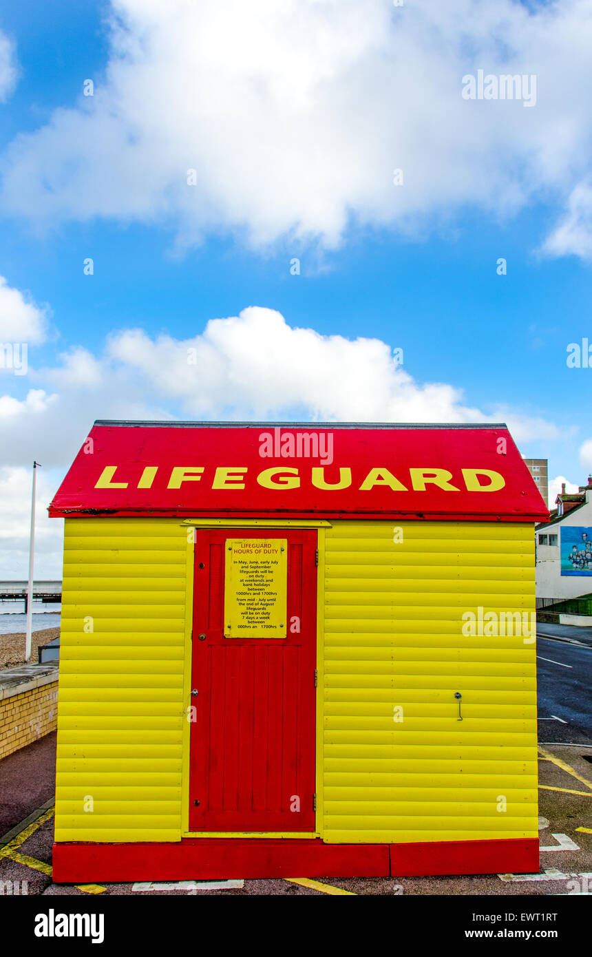 Bright yellow and red lifeguard hut. With copy space. Herne Bay, Kent, UK Stock Photo