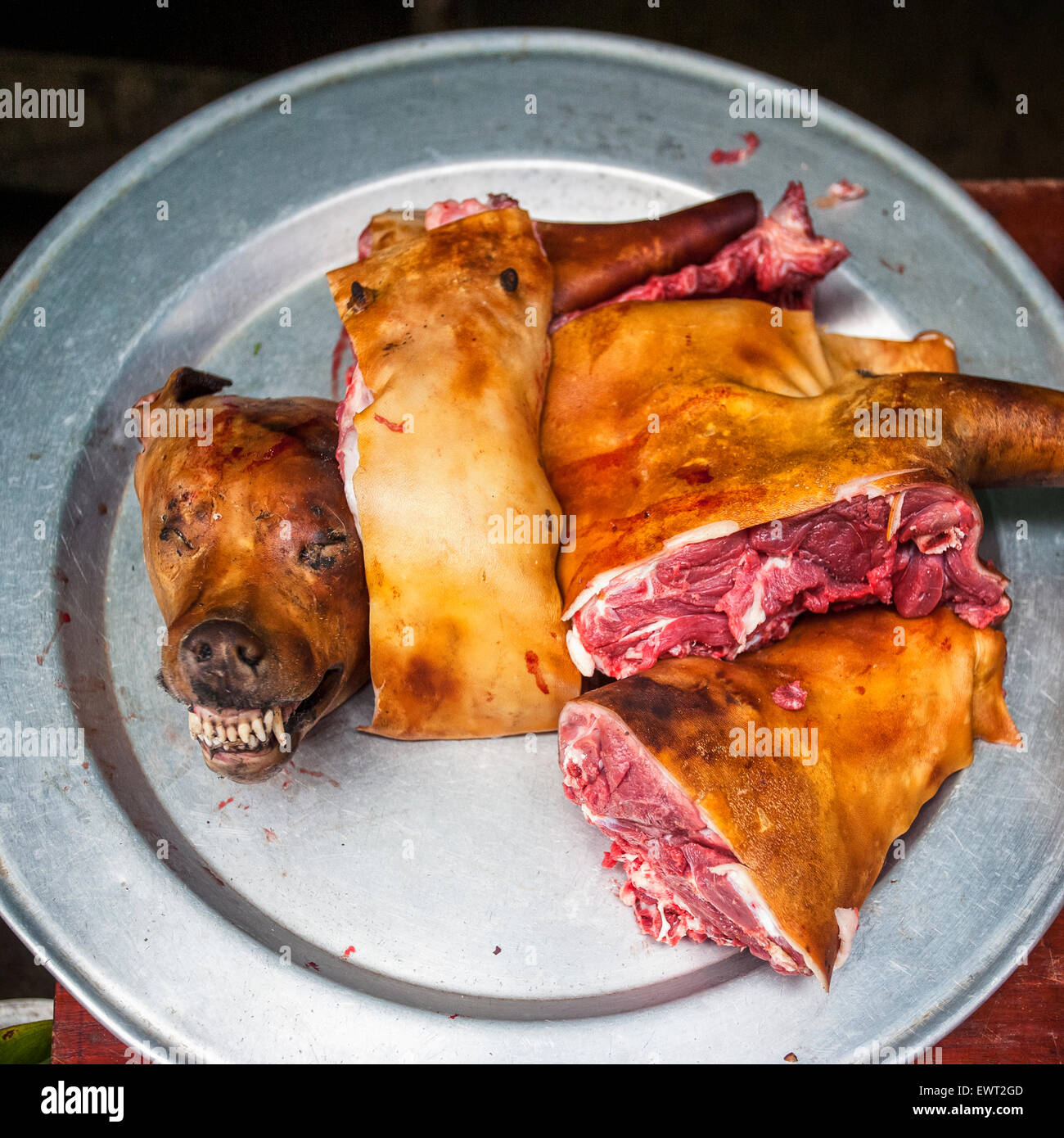 Cooked dog on a plate in Sapa,Vietnam. Stock Photo