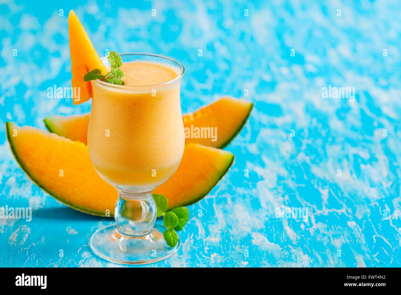 "Cantaloupe Breeze". Melon drink in glasses with slices of melon and