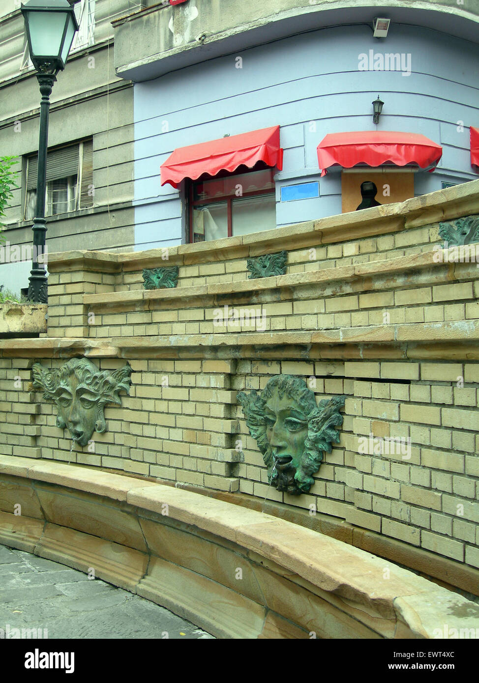 public water fountain for drinking or bathing in historic tourist bohemian quarter of Skadarlija Belgrade Serbia Europe Stock Photo