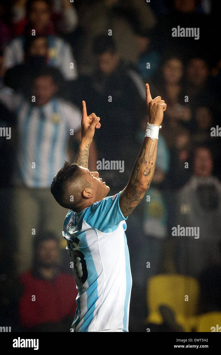 Concepcion, Chile. 30th June, 2015. Marcos Rojo of Argentina celebrates scoring during the semifinal between Argentina and Paraguay at the 2015 Copa America, in Concepcion, Chile, on June 30, 2015. Argentina won 6-1 and was qualified for the final. Credit:  Pedro Mera/Xinhua/Alamy Live News Stock Photo