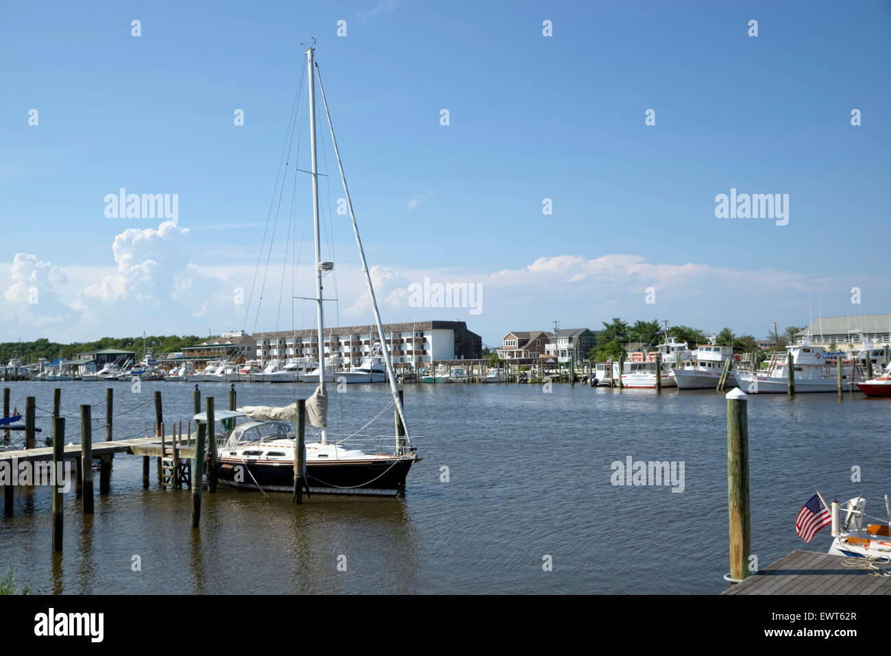 A sailboat docks along the waterfront in Lewes, Delaware (USA Stock