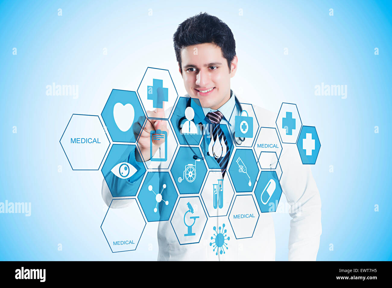 Indian male doctor examining hi-res stock photography and images - Alamy