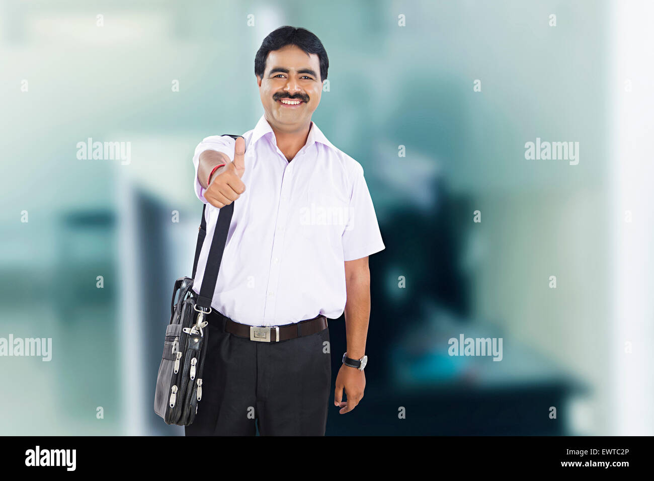 1 indian Salesperson man thumbs up showing Stock Photo Alamy
