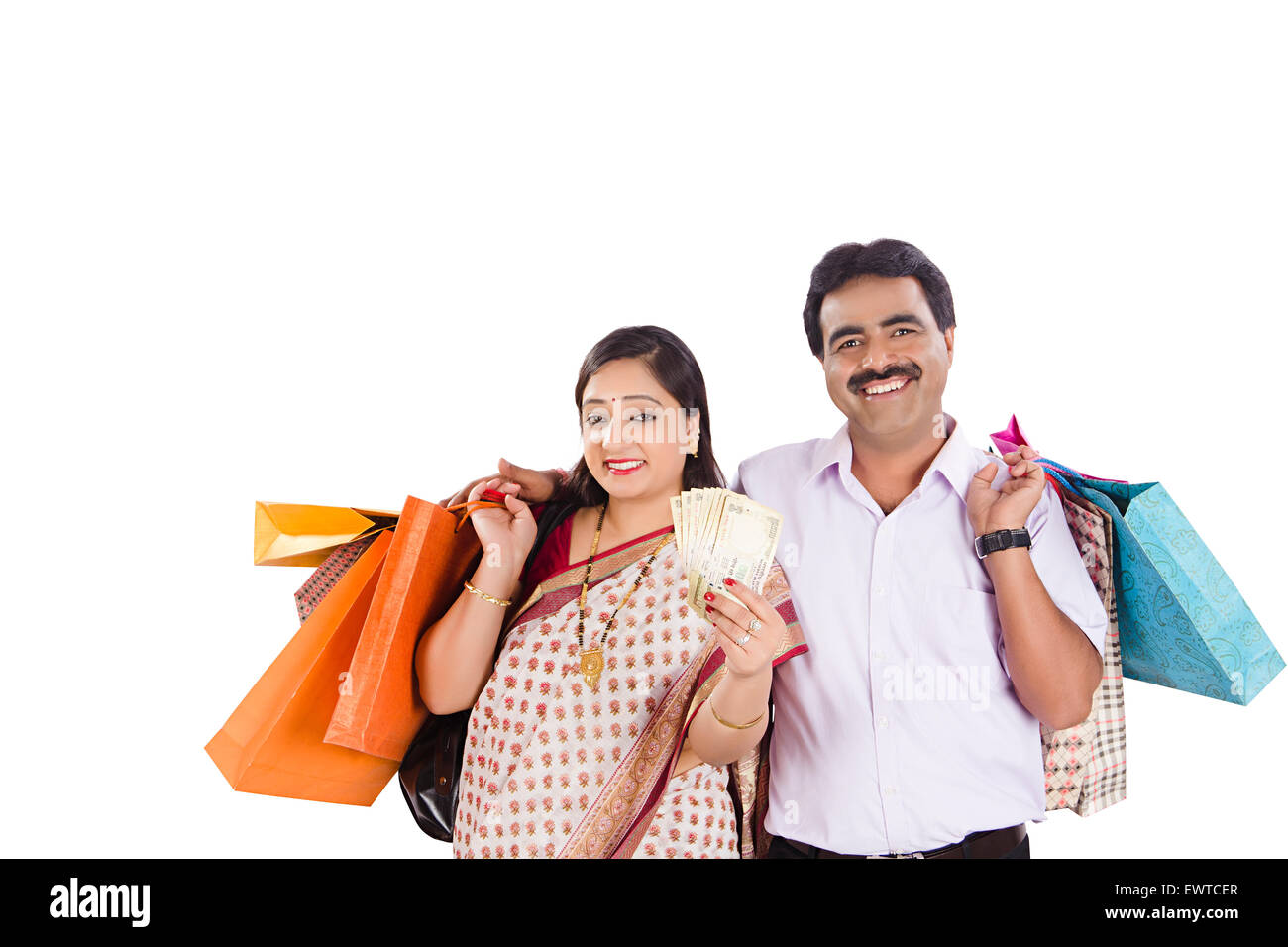 2 indian Married Couple shopping money showing Stock Photo - Alamy