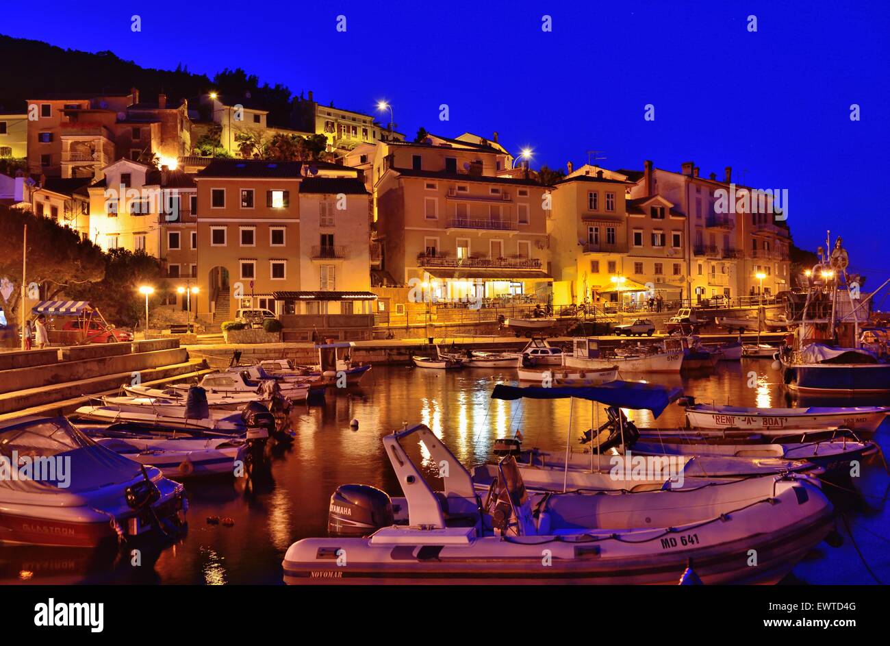 Historic centre and harbor at night on the Adriatic coast, Moscenicka Draga, Primorje-Gorski Kotar, Kvarner Gulf, Istria Stock Photo