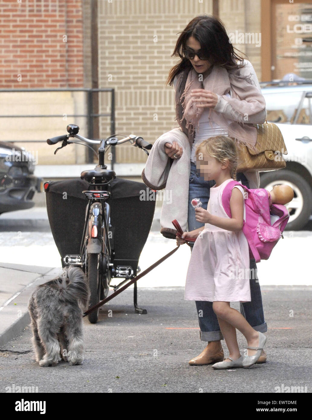 Bethenny Frankel with daughter Bryn as they take their dog for a