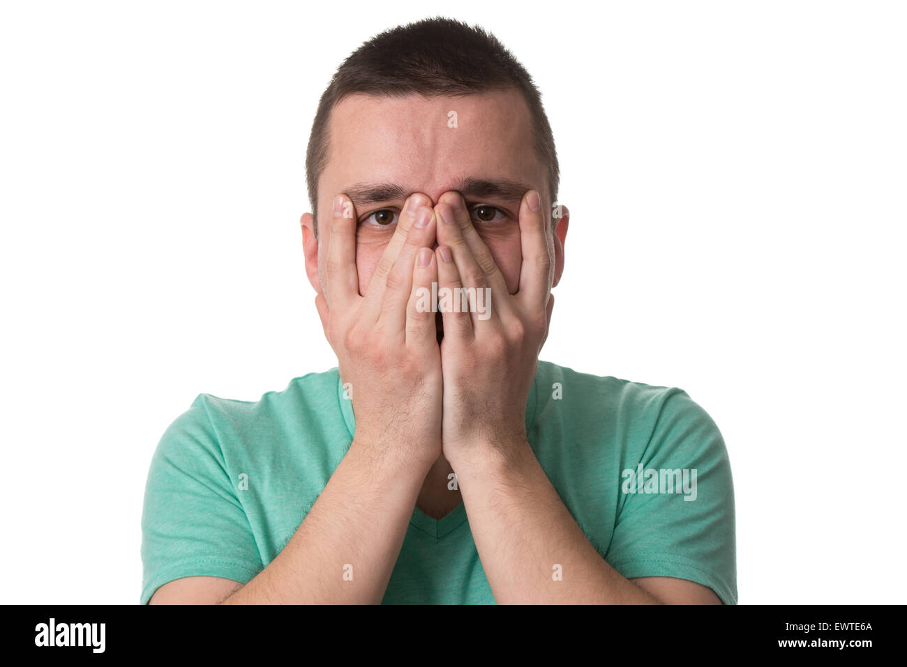 Portrait Of Young Stressed Caucasian Man Covers His Face With Hands ...