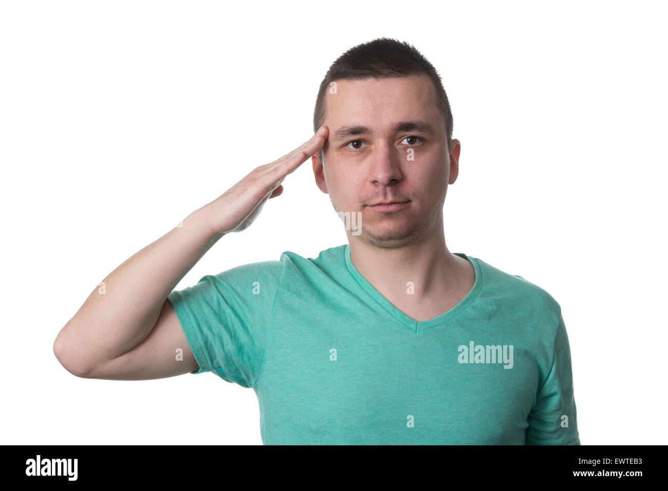 Young Man Saluting Isolated On White Background Stock Photo