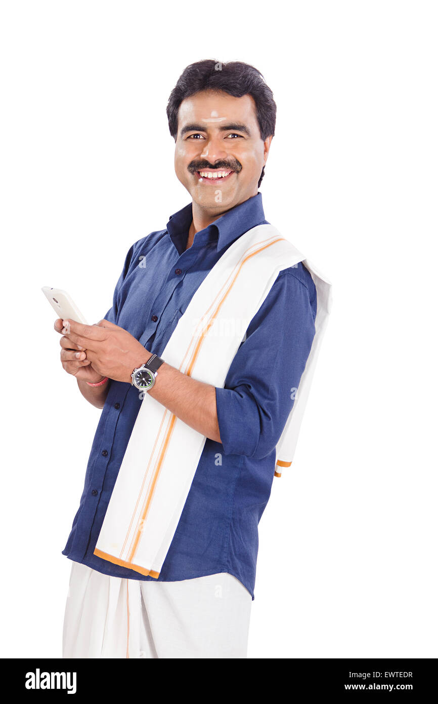 1 South Indian man dialing Cell Phone Stock Photo