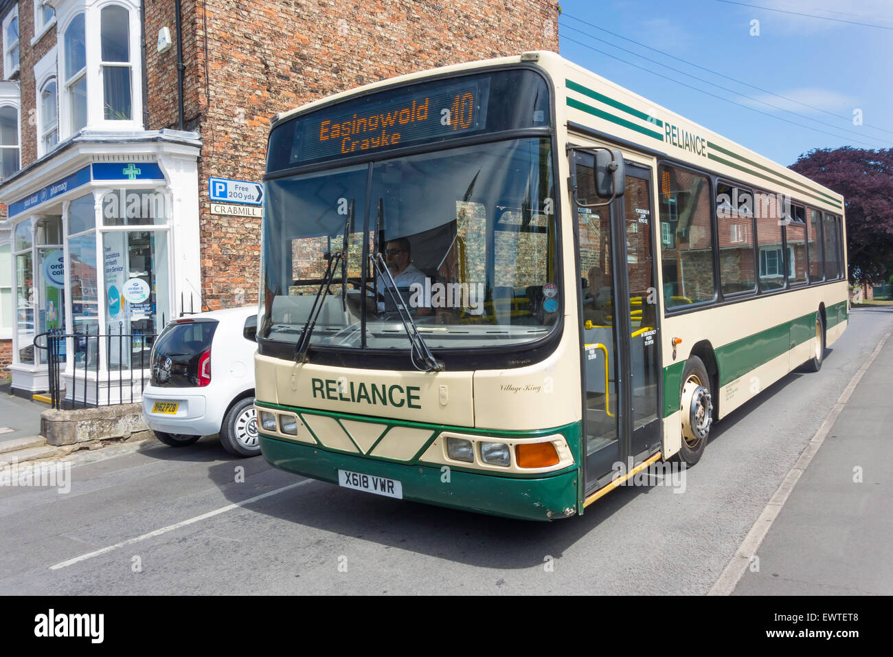 Reliance bus from York arriving at the Market Square in Easingwold Town Centre Stock Photo