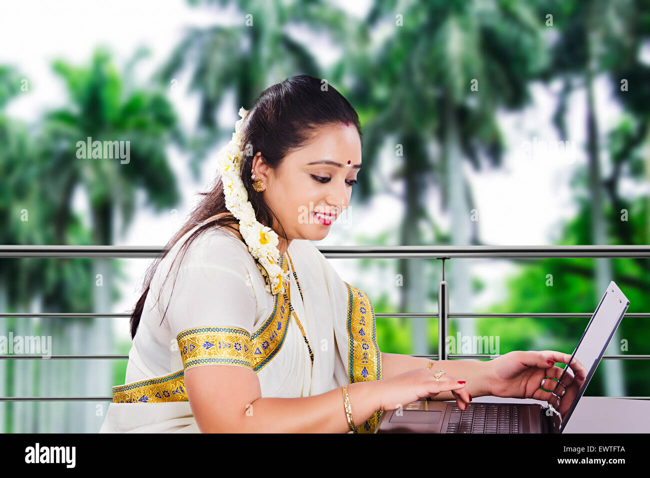 1 South Indian woman laptop working Stock Photo