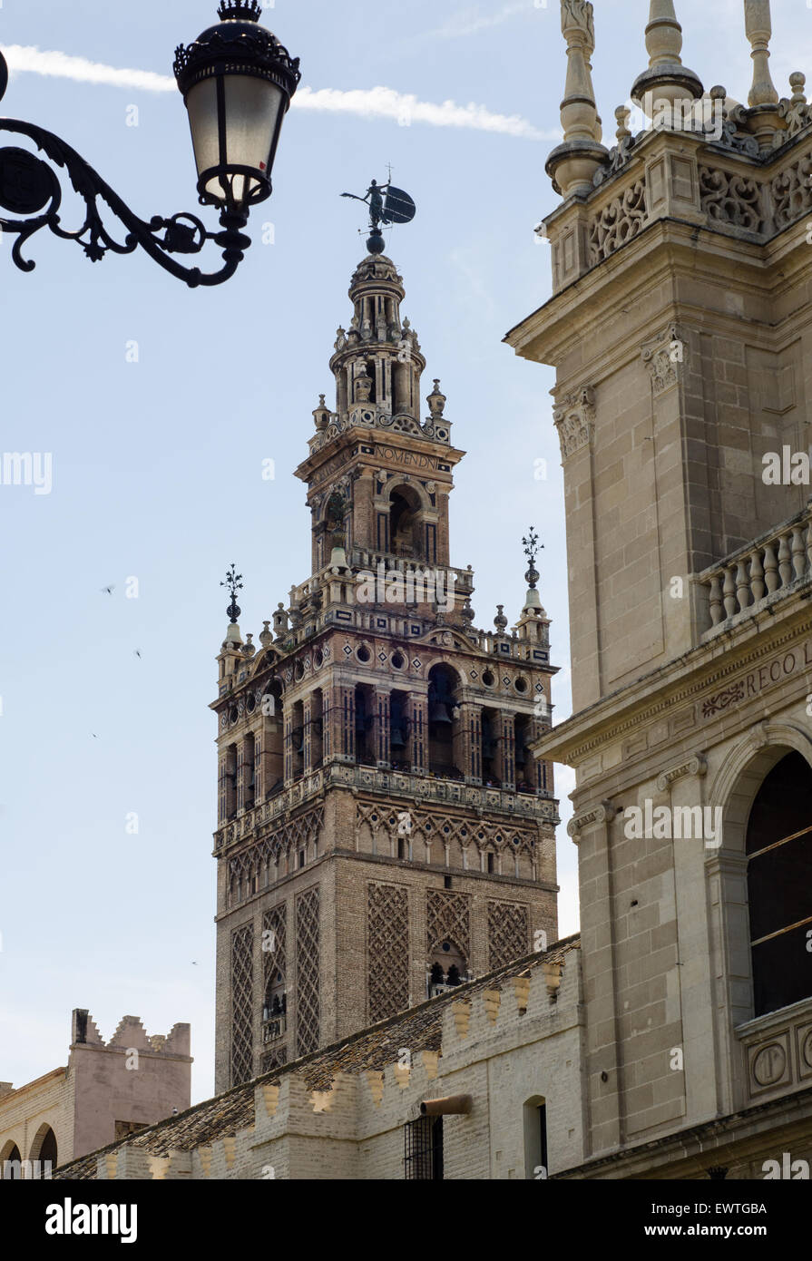 La Giralda, the bell tower of the Cathedral of Seville, Spain, one of the largest churches in the world and an amazing example of Almohad architecture Stock Photo