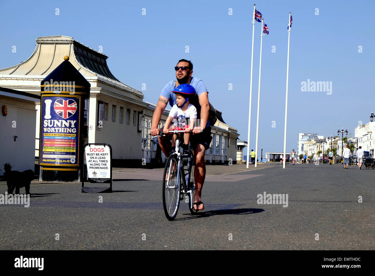 Worthing West Sussex UK, 1st July 2015. On what is forecast to be the hottest day of the year there is a gentle wind blowing along with the beautiful blue skies at Worthing, making the beaches a pleasurable place to be. Credit:  Photovision Images News/Alamy Live News Stock Photo