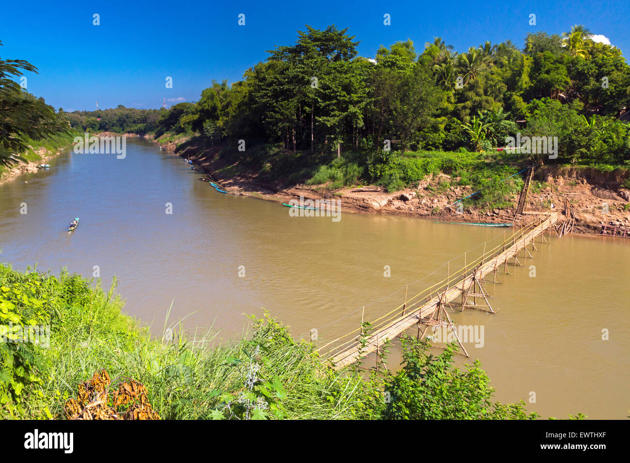 Footbridge across Nam Khan river, Luang Prabang, Laos Stock Photo