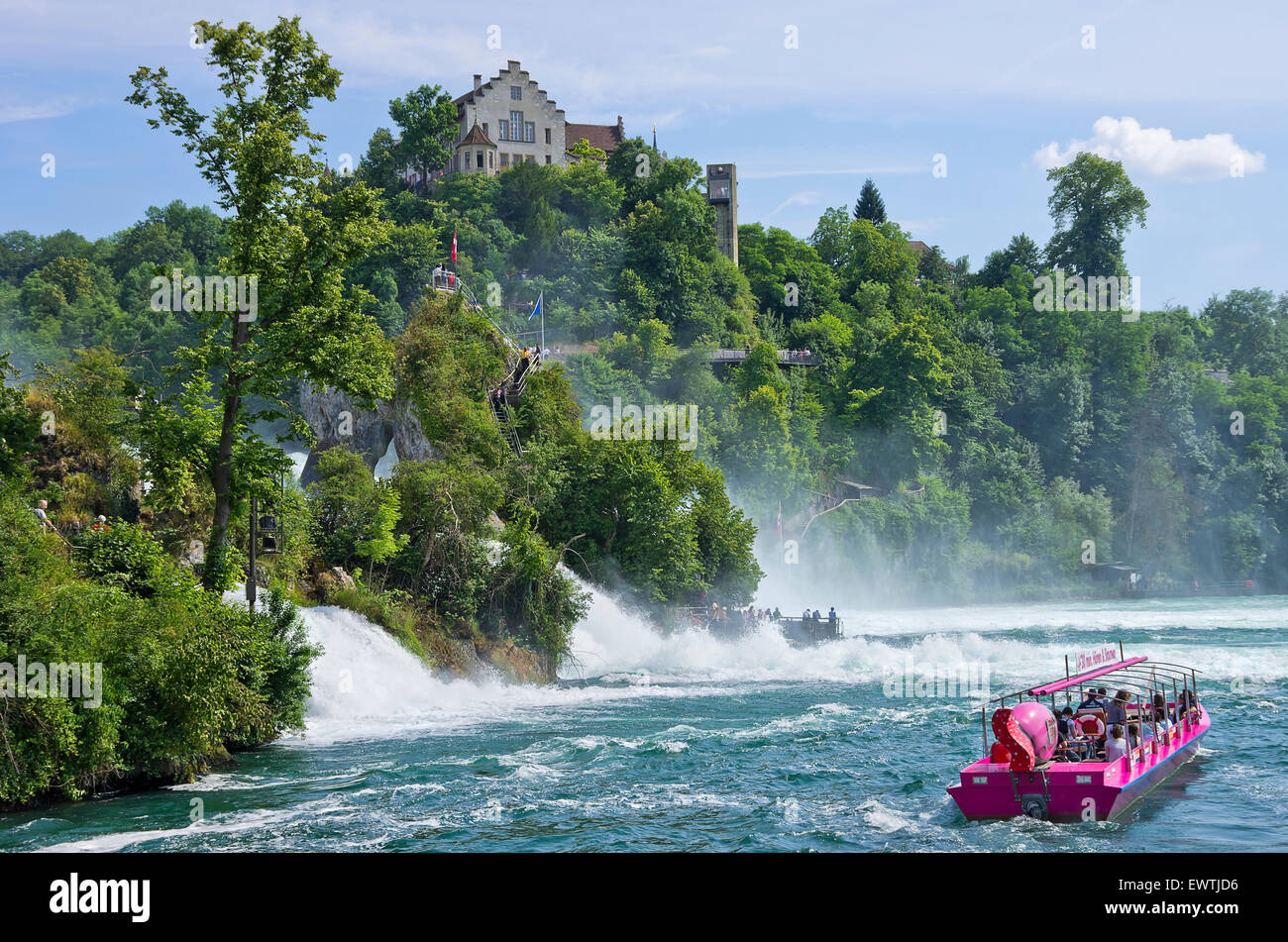 The Rhine Falls with excursion boat and Lauffen Castle, Schaffhausen, Switzerland. Stock Photo