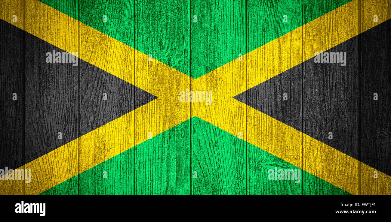 Jamaica flag or Jamaican banner on wooden boards background Stock Photo