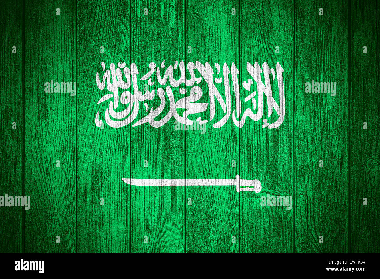 Saudi Arabia flag or Saudi Arabian banner on wooden boards background Stock Photo