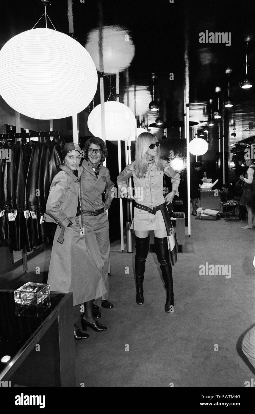 Yves Saint Laurent, designer pictured inside his first London Rive Gauche store on New Bond Street, London, opening day of boutique, and with muses Louise de La Falaise, aka Loulou (left) and Betty Catroux (right). 10th September 1969. Stock Photo