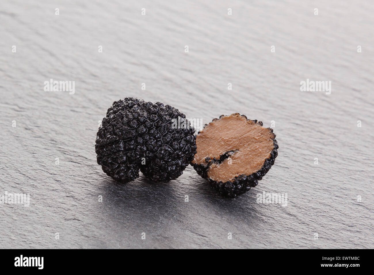 Truffles, rare mushrooms. Luxurious culinary cooking ingredients Stock