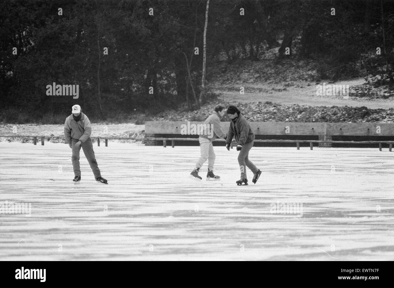Ice Skating on frozen lake, Sutton Park, Birmingham, England, 17th February 1986 Stock Photo Alamy